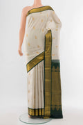 Pure Silk Pure Zari Cream Kanchipuram Saree with Zari Butta on the body and Silk Border.  displayed on a mannequin