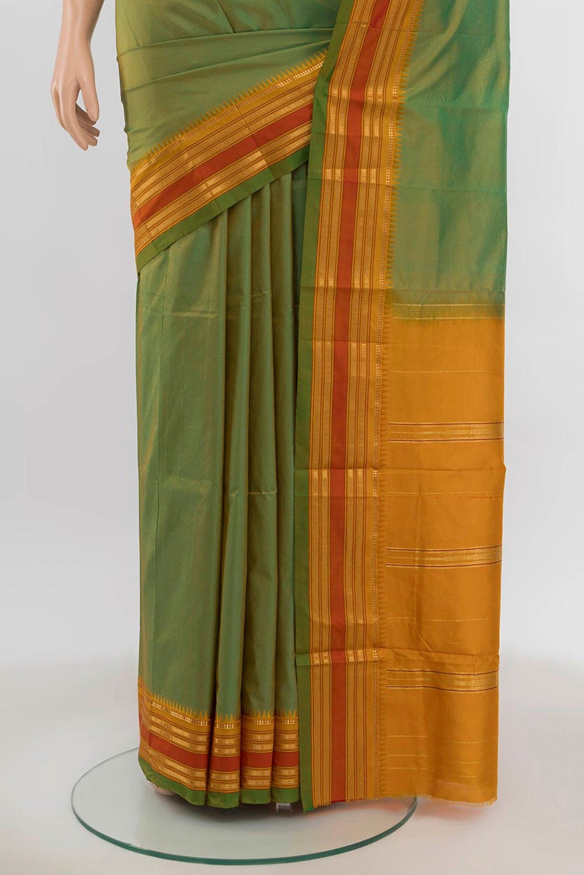 Pleats and pallu of Parrot Green Narayanpet Silk Saree with Zari Butta on the body and Silk Border. 