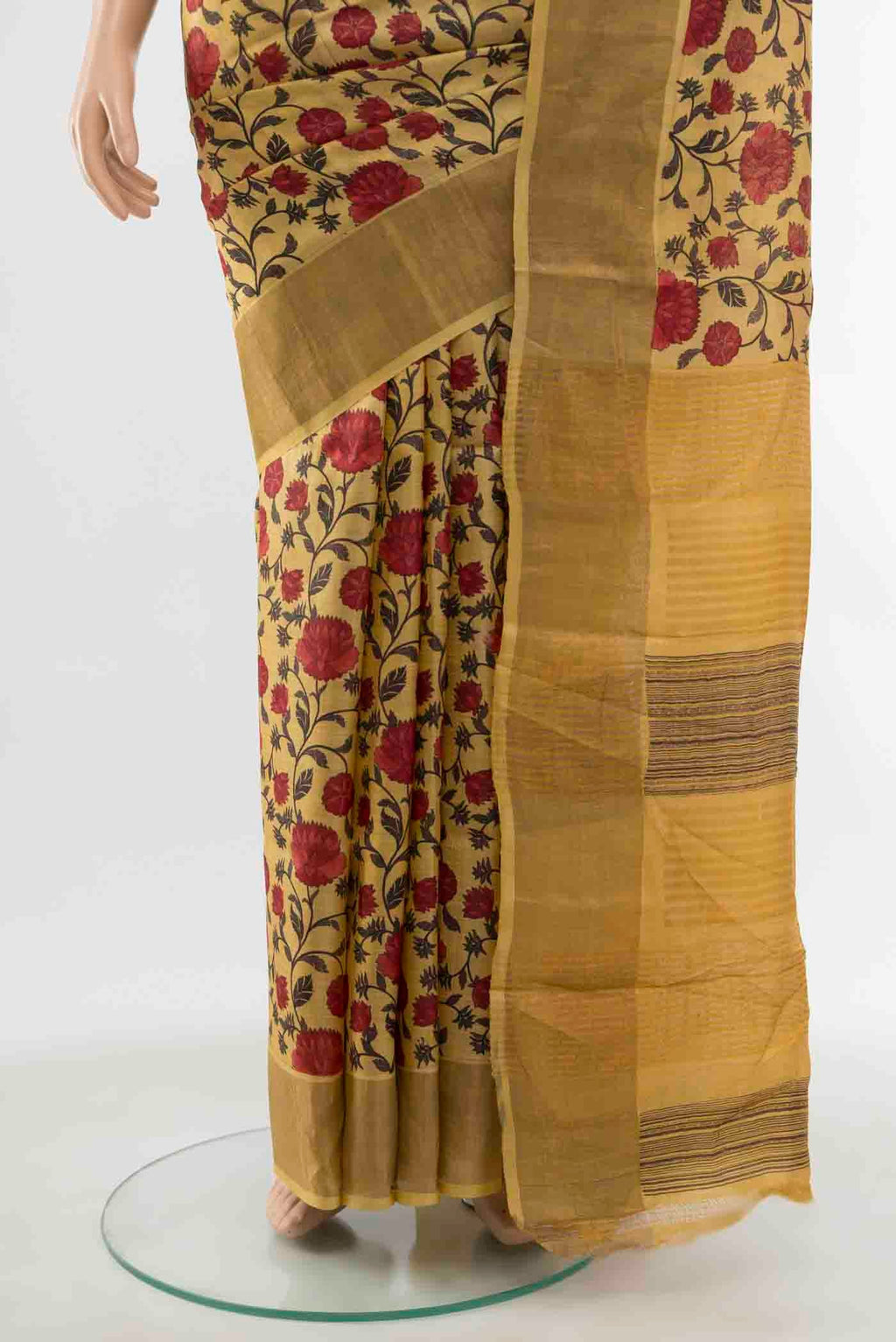 Pleats and pallu of Mustard Tussar Saree with Floral Print on the body and Silk Border