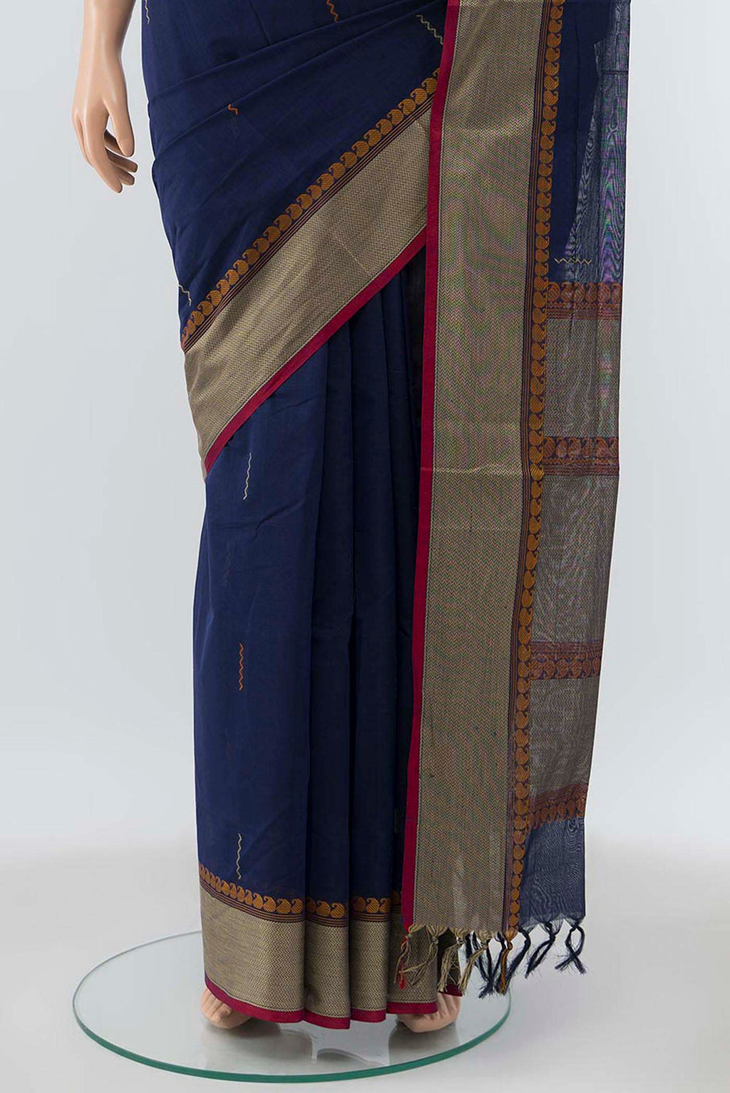Pleats and pallu of Navy Blue Coimbatore Cotton Saree with Ikat Print on the body and Thread Embroidery Border