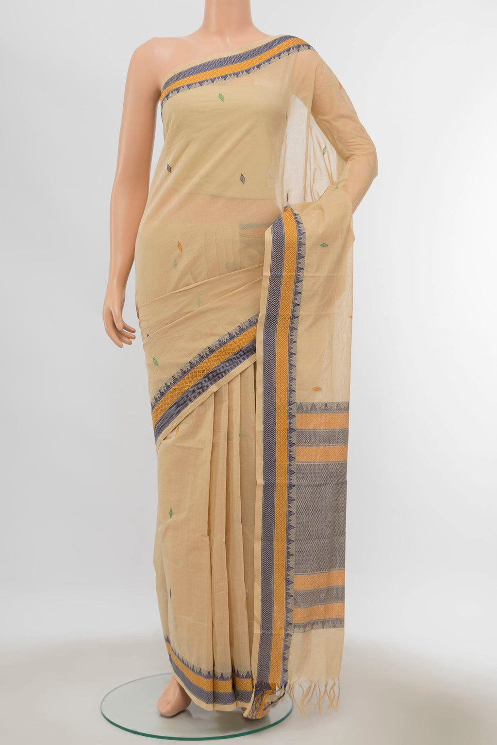 Beige Coimbatore Cotton Saree with Thread Butta on the body and Thread Border displayed on a mannequin