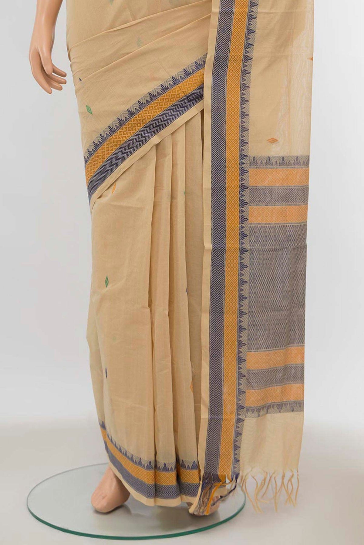 Pleats and pallu of Beige Coimbatore Cotton Saree with Thread Butta on the body and Thread Border