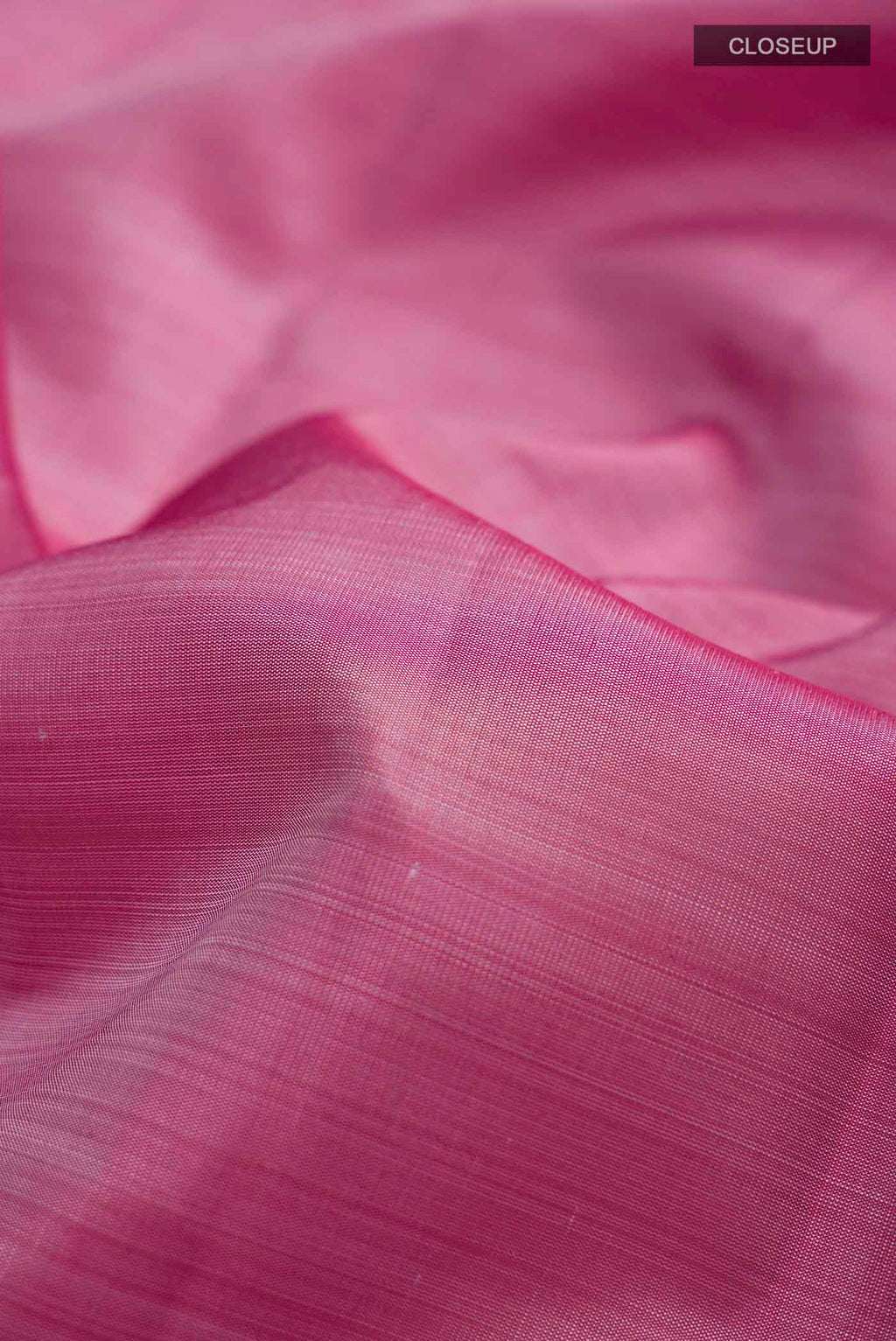 Close up of Mauve Kanchipuram Silk Saree with Plain Body and Temple Border displaying folds