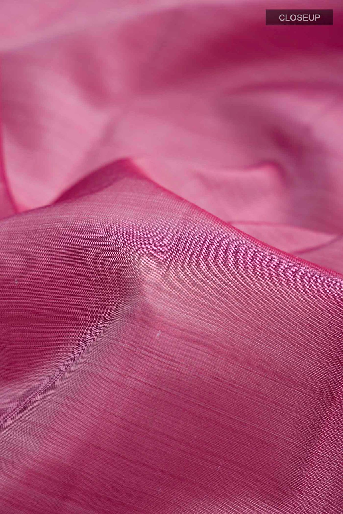 Close up of Mauve Kanchipuram Silk Saree with Plain Body and Temple Border displaying folds