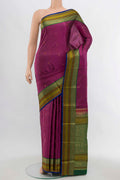 Magenta Soft Silk Saree with Zari Butta on the body and Silk Border displayed on a mannequin