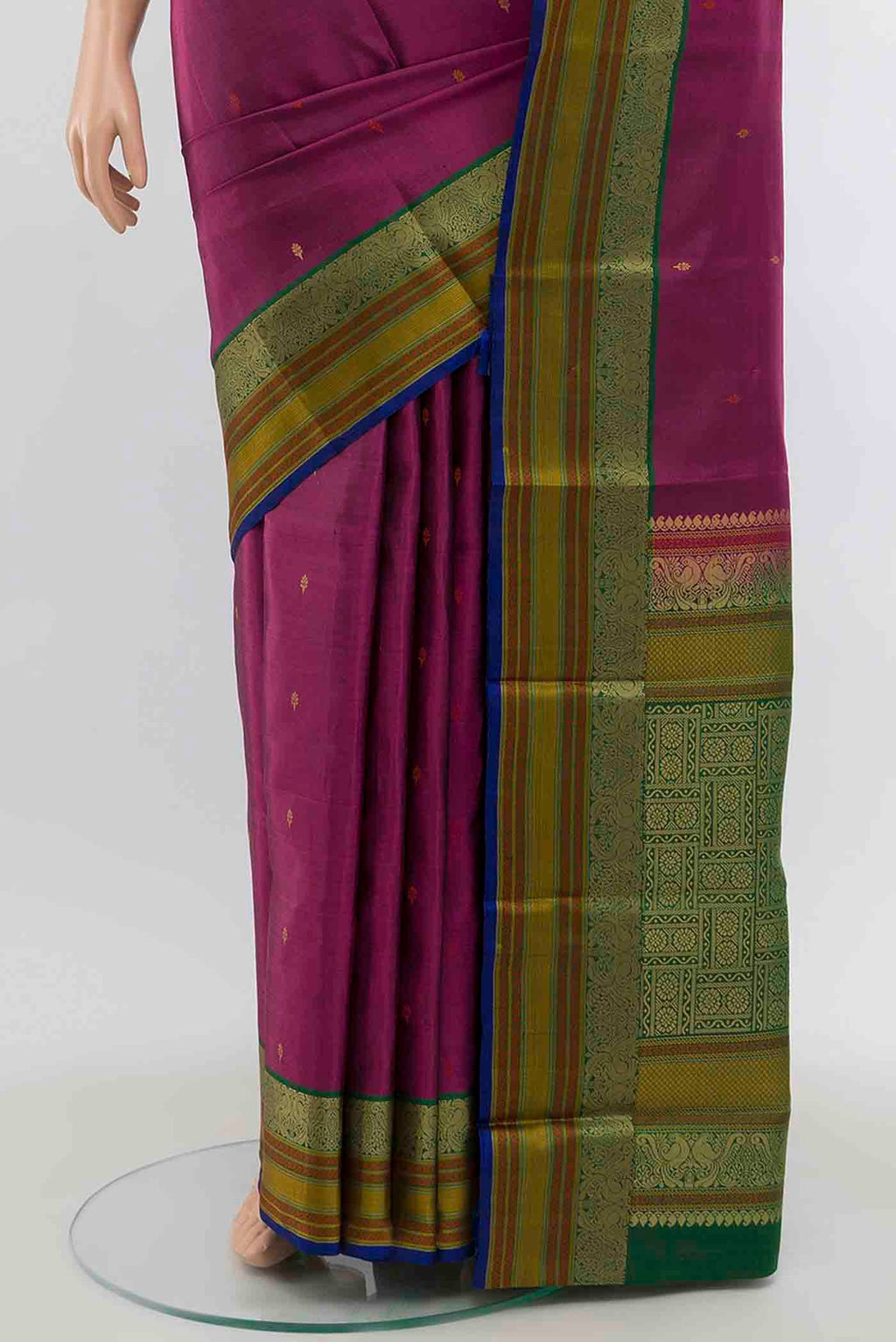 Pleats and pallu of Magenta Soft Silk Saree with Zari Butta on the body and Silk Border