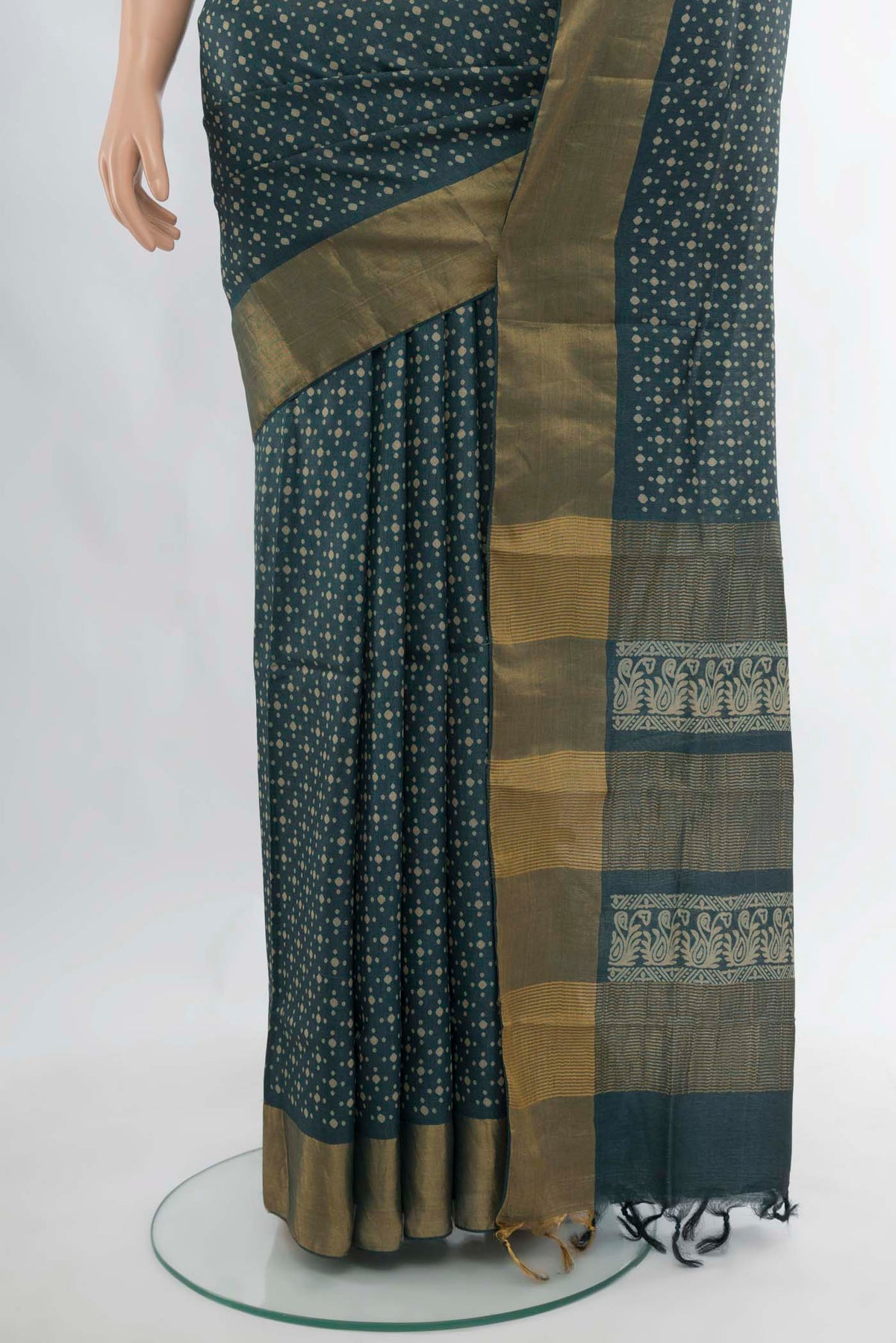 Pleats and pallu of Navy Blue Tussar Silk Saree with Floral Print on the body and Silk Border. 