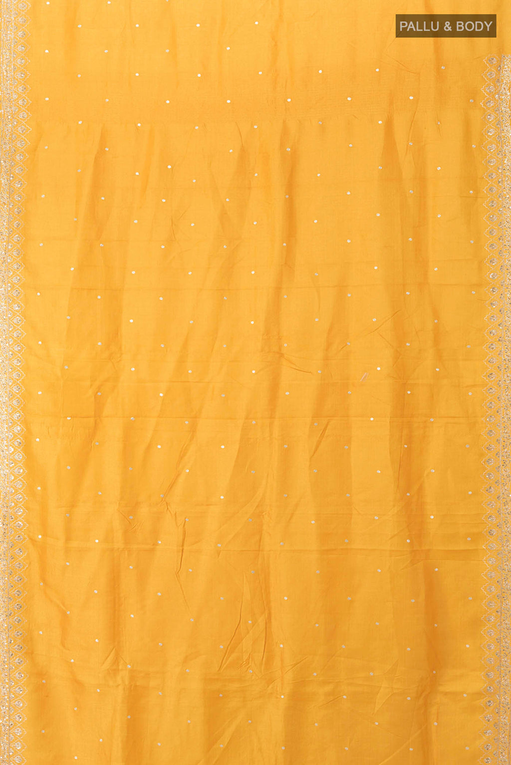 Flat view of Yellow Tussar Silk Saree with Zari Butta on the body and Silk Border