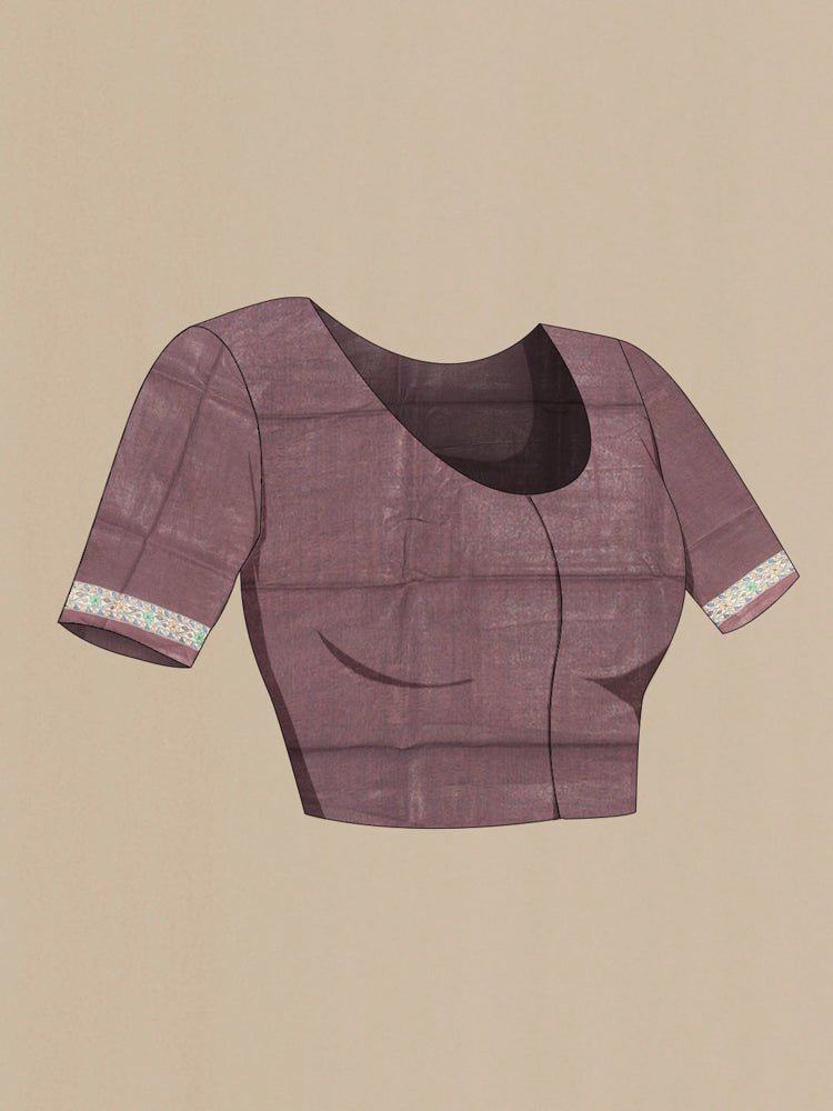 Close up image of the blouse of Brown Tussar Silk Saree with Floral Print on the body and Silk Border. 