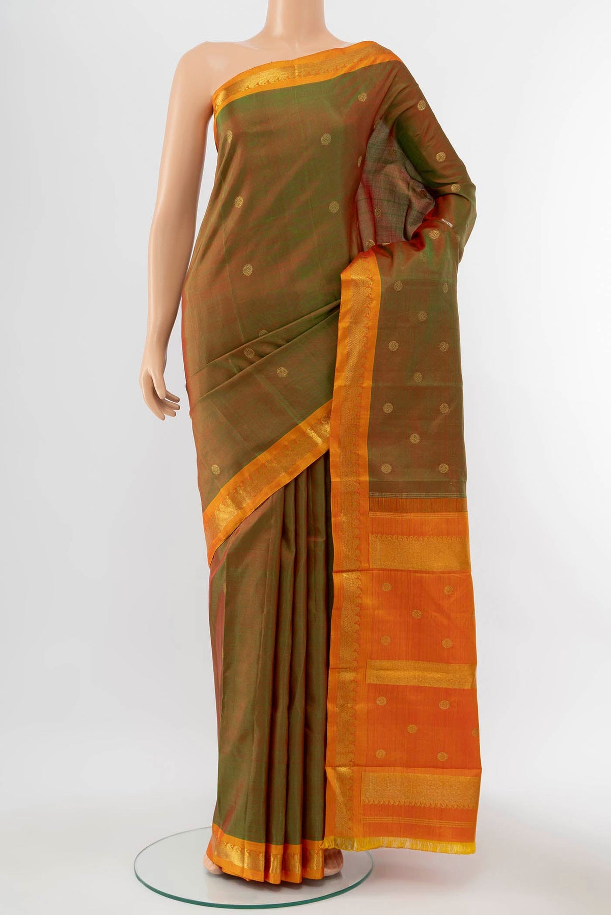 Pure Silk Pure Zari Light Green Kanchipuram Saree with Zari Brocade on the body and Silk Border displayed on a mannequin