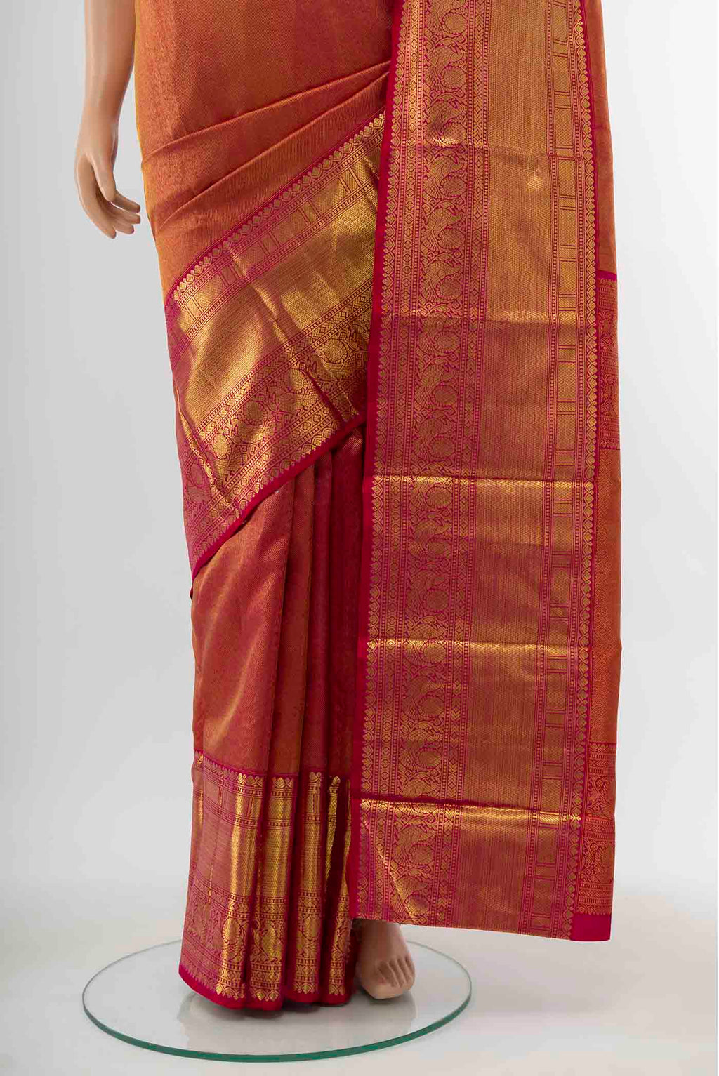 Pleats and pallu of Pure Silk Pure Zari Pink Kanchipuram Saree with Zari Butta on the body and Silk Border
