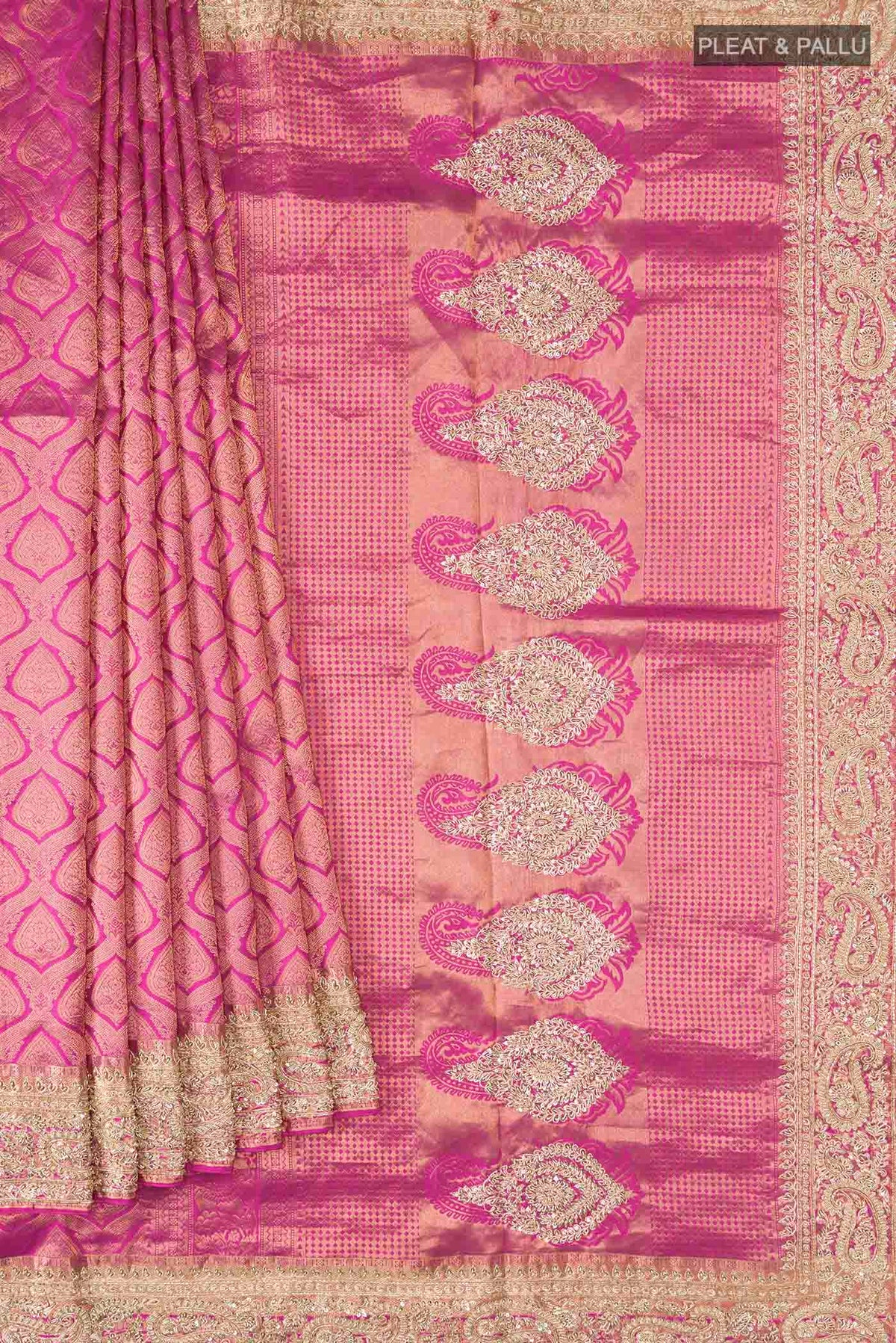 Pleats and pallu of Pink Kanchipuram Silk Saree with Zari Brocade on the body and Embroidery Border