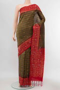Beige Blended Soft Silk Saree with Zari Butta on the body and Zari Border displayed on a mannequin
