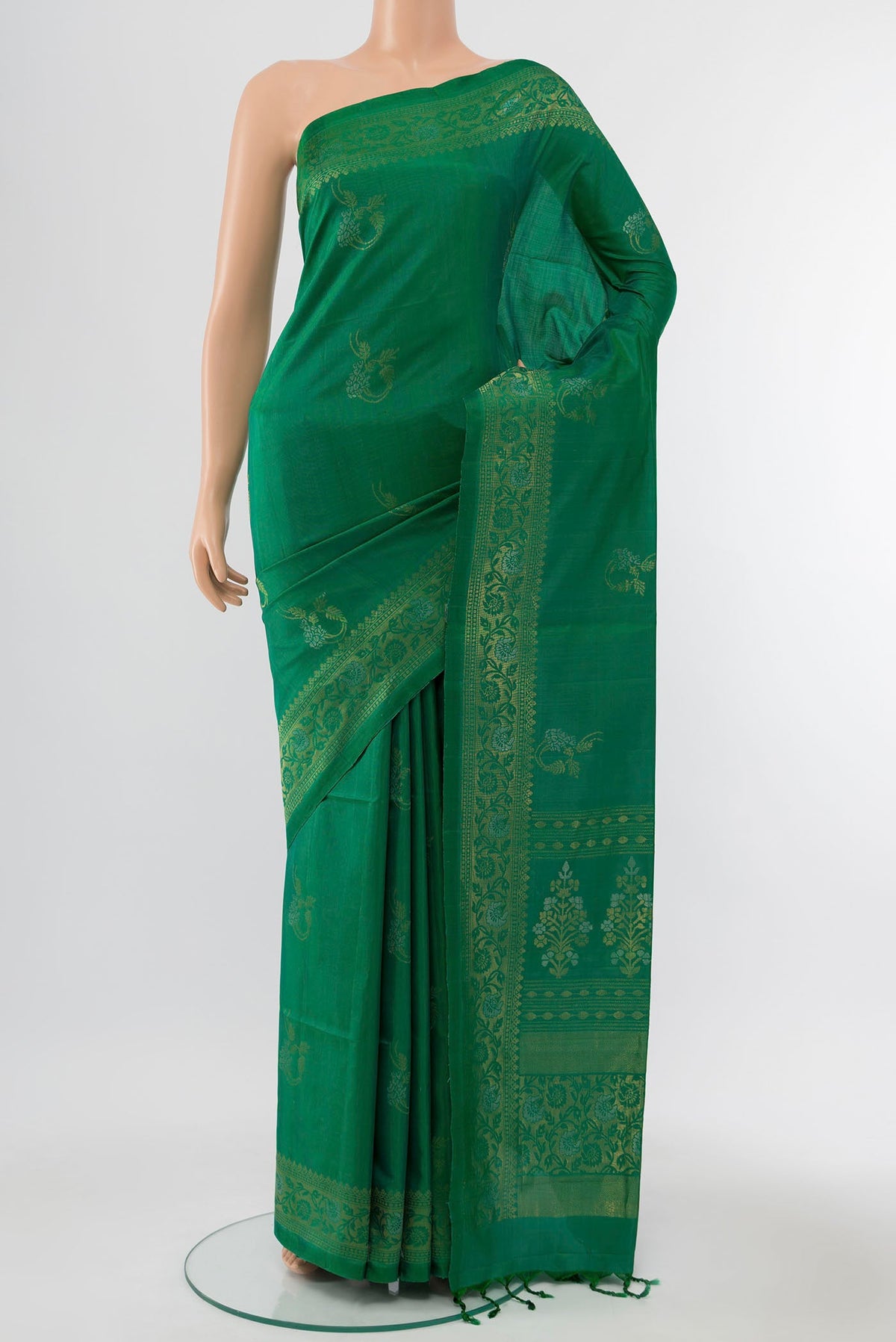 Pure Silk Pure Zari Mehandi Green Soft Saree with Zari Butta on the body and Silk Border displayed on a mannequin