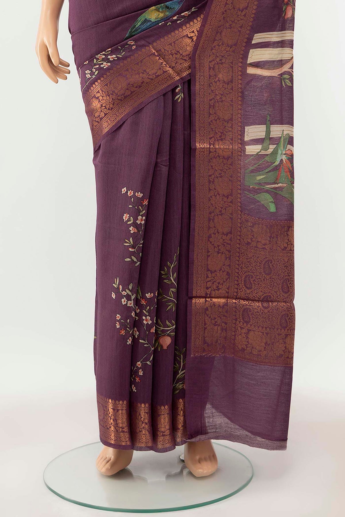 Pleats and pallu of Purple Tussar Silk Saree with Zari Butta on the body and Silk Border