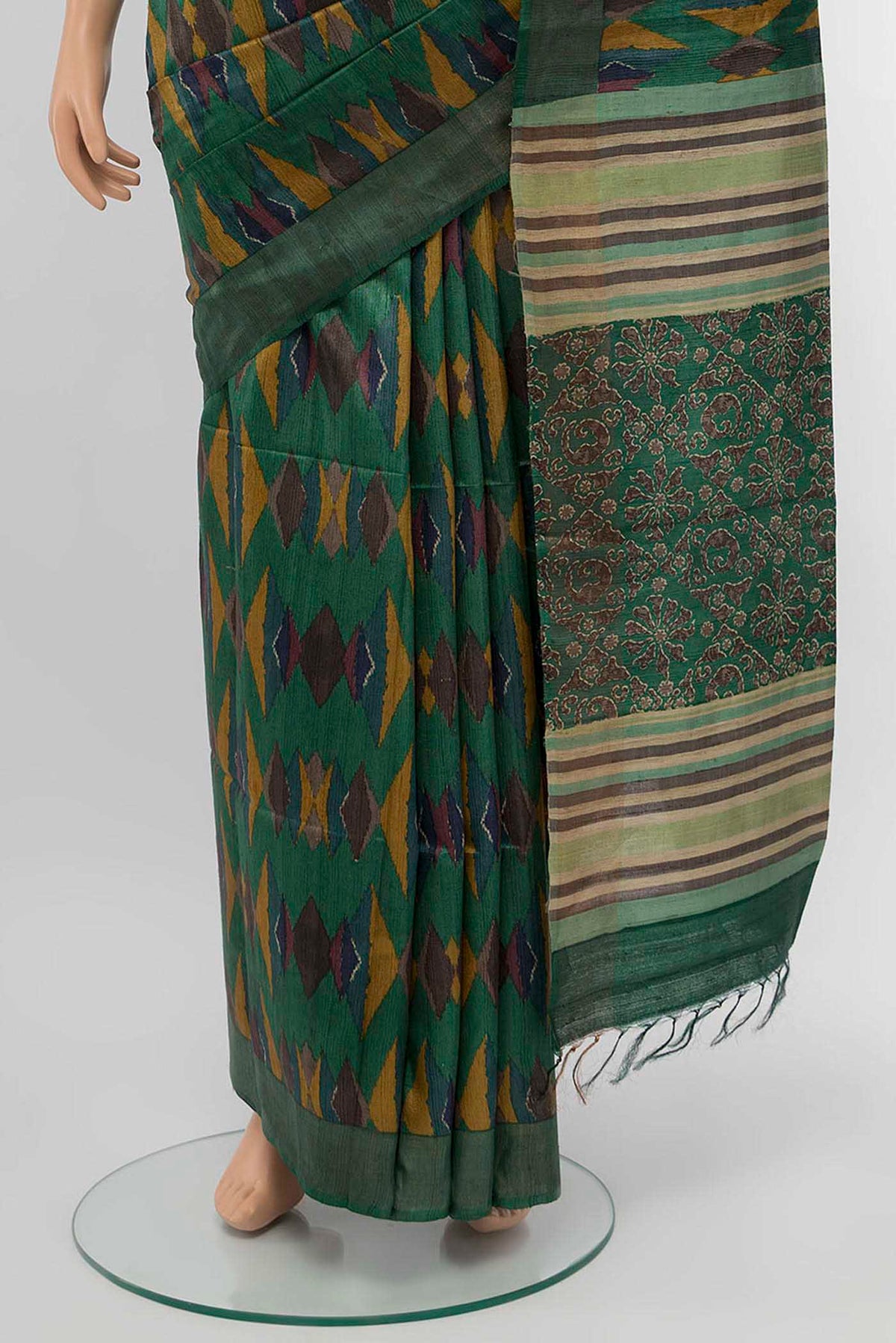Pleats and pallu of Green Tussar Saree with Stripes on the body and Fancy Border