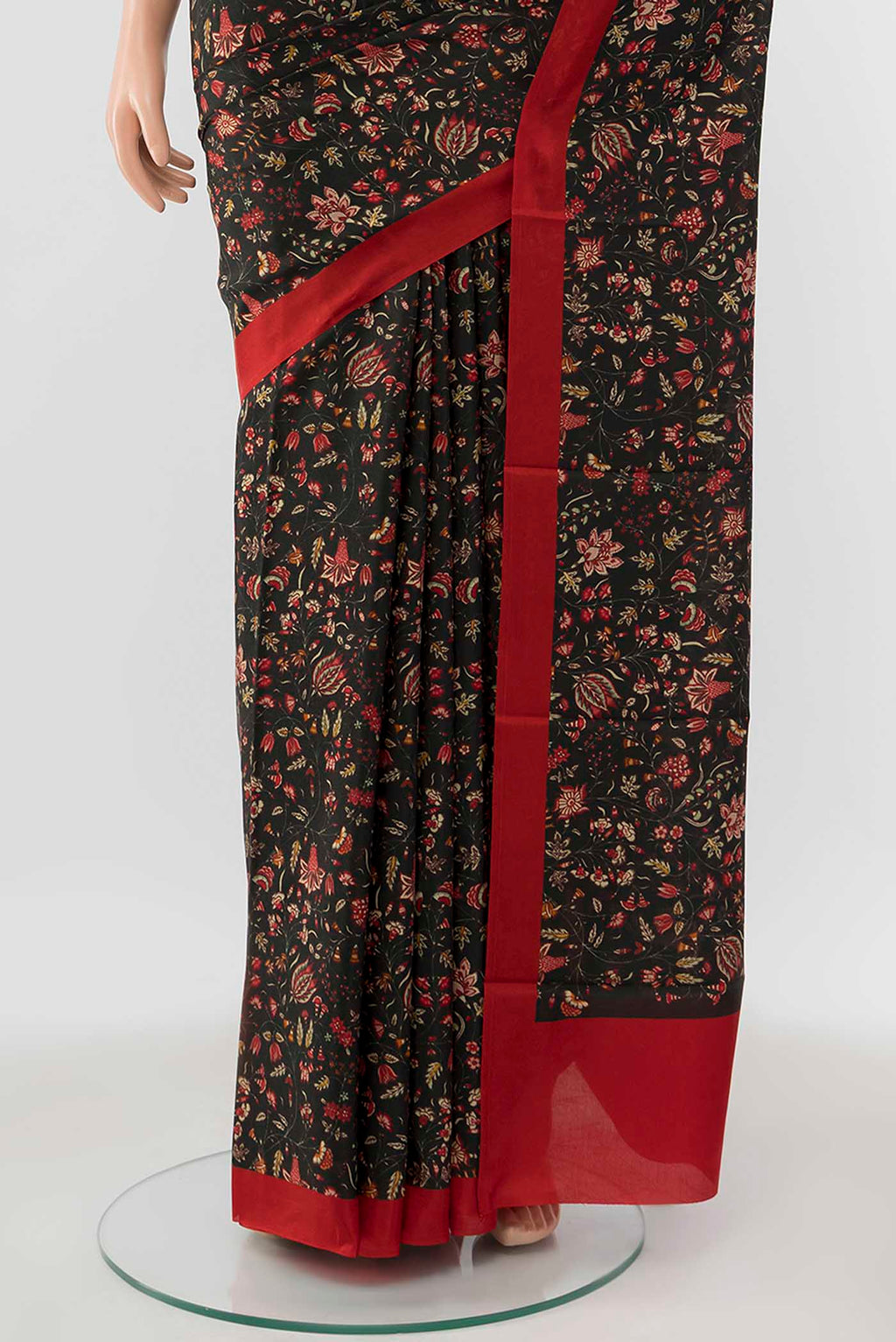 Pleats and pallu of Black Printed Silk Saree with Thread Butta on the body and Silk Border