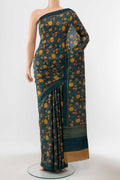Peacock Blue Printed Silk Saree with Floral Print on the body and Silk Border displayed on a mannequin