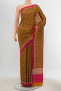 Mustard Printed Silk Saree with Floral Print on the body and Silk Border displayed on a mannequin
