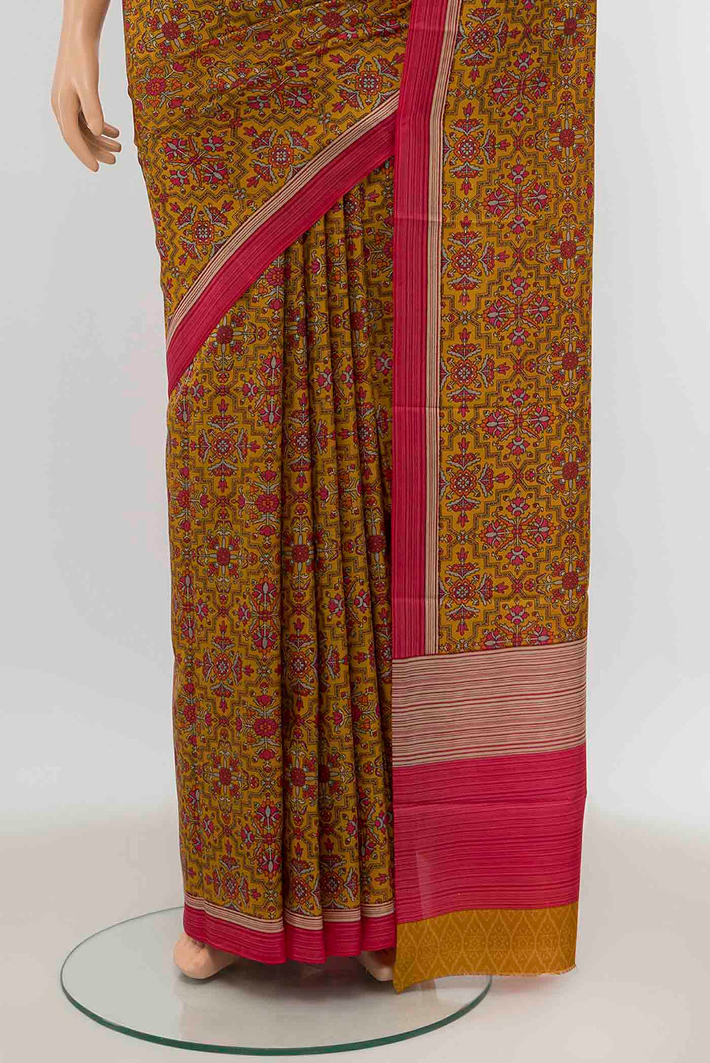 Pleats and pallu of Mustard Printed Silk Saree with Floral Print on the body and Silk Border