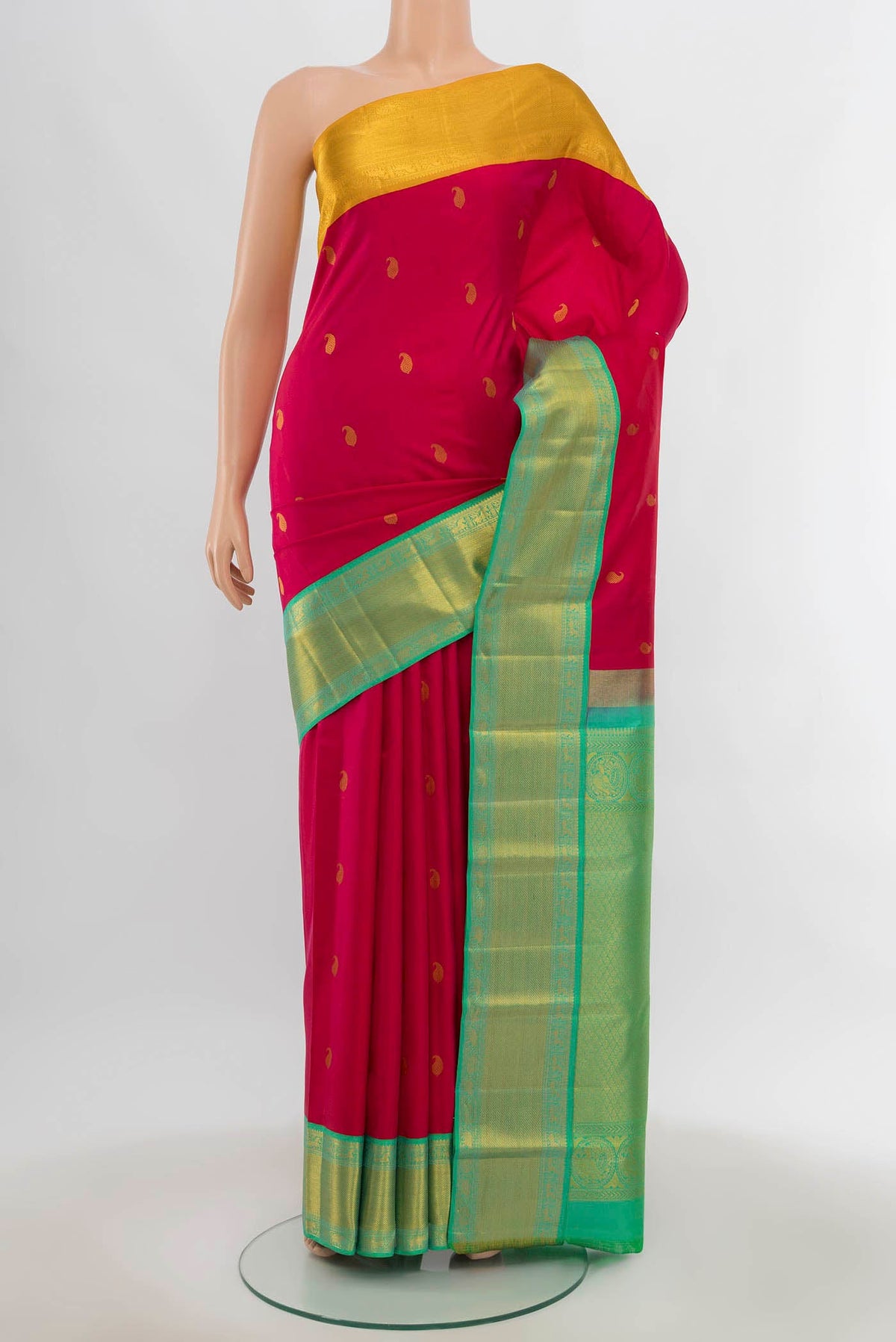 Imperial Pink Kanchipuram Silk Saree with Zari Butta on the body and Silk Border.  displayed on a mannequin
