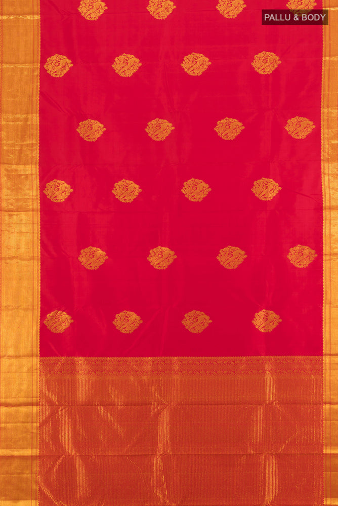 Flat view of Red Kanjivaram Silk Saree with Zari Butta on the body and Zari Border. 
