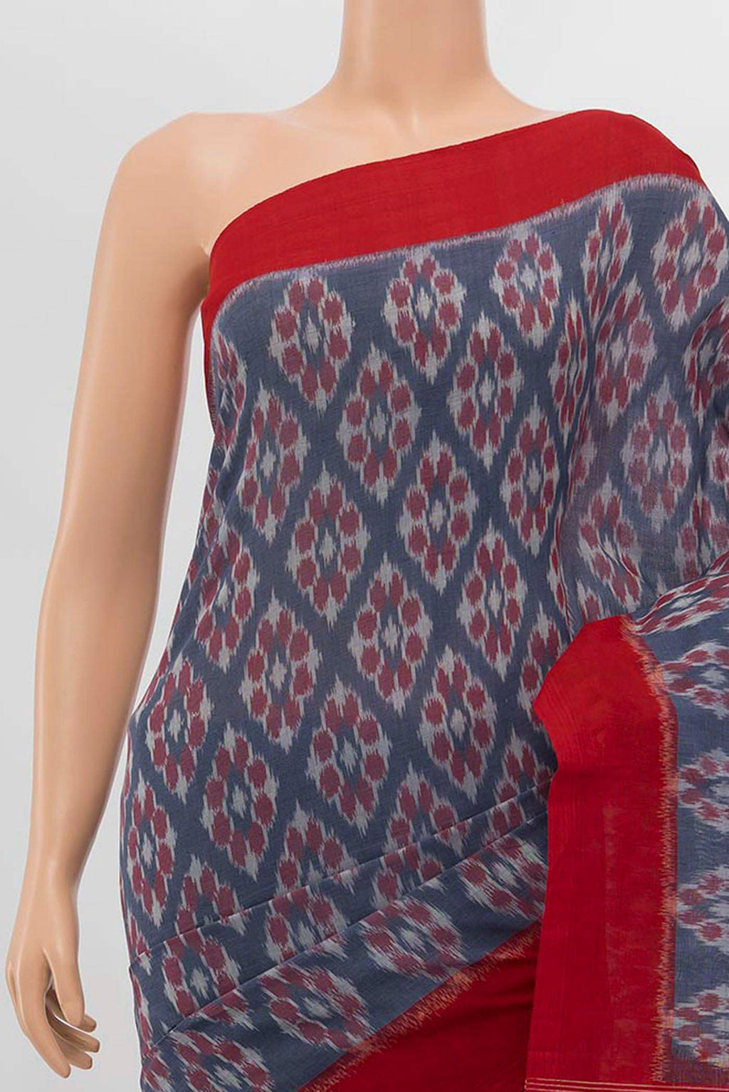 Border image of Blue Cotton Saree with Pure Ikat on the body and Plain Border