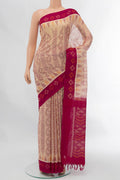 Beige Pochampally Cotton Saree with Floral Print on the body and Ikat Border displayed on a mannequin