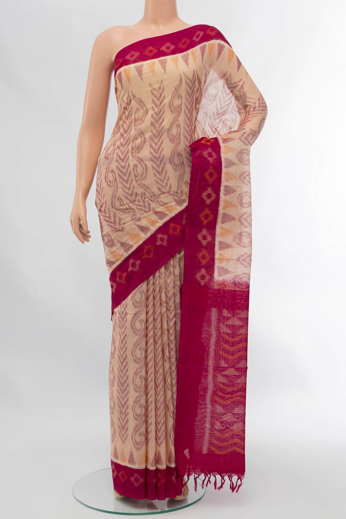 Beige Pochampally Cotton Saree with Floral Print on the body and Ikat Border displayed on a mannequin