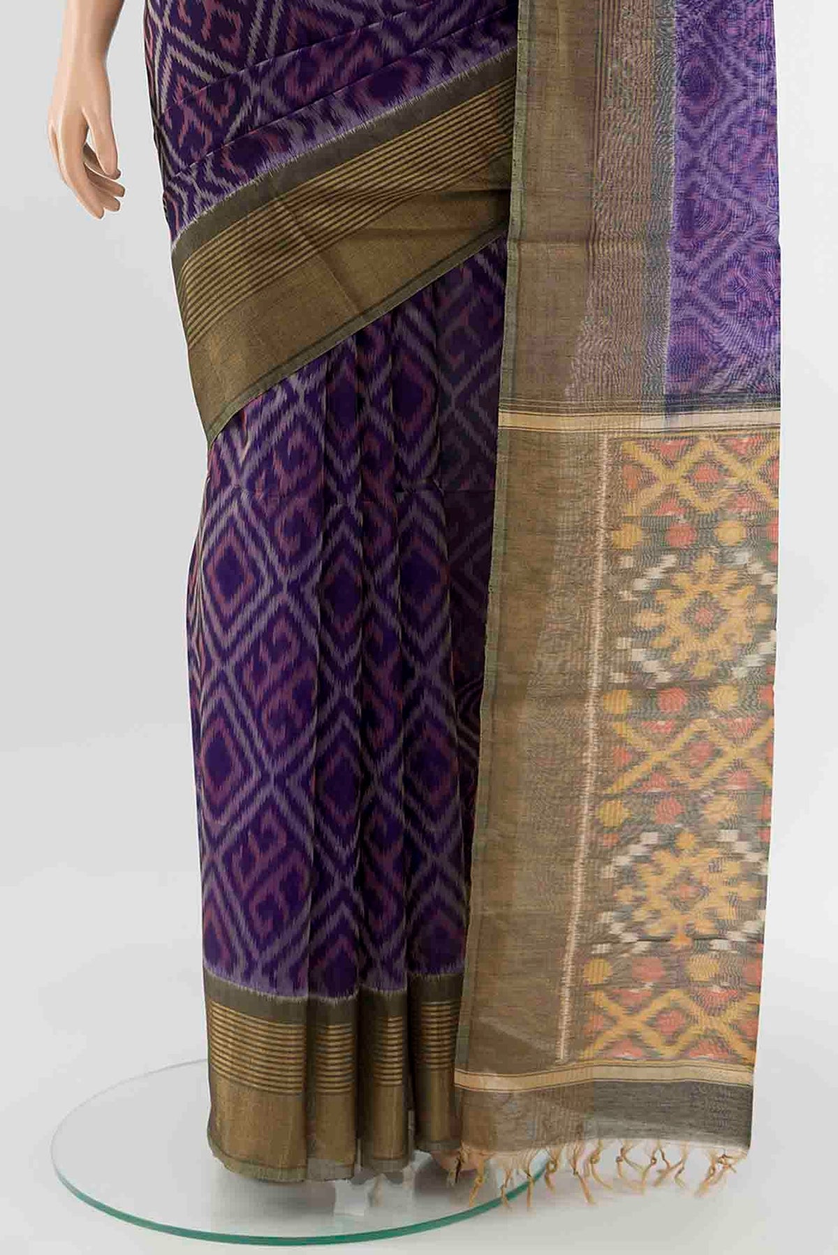 Pleats and pallu of Navy Blue Kora Cotton Saree with Ikat Print on the body and Fancy Border