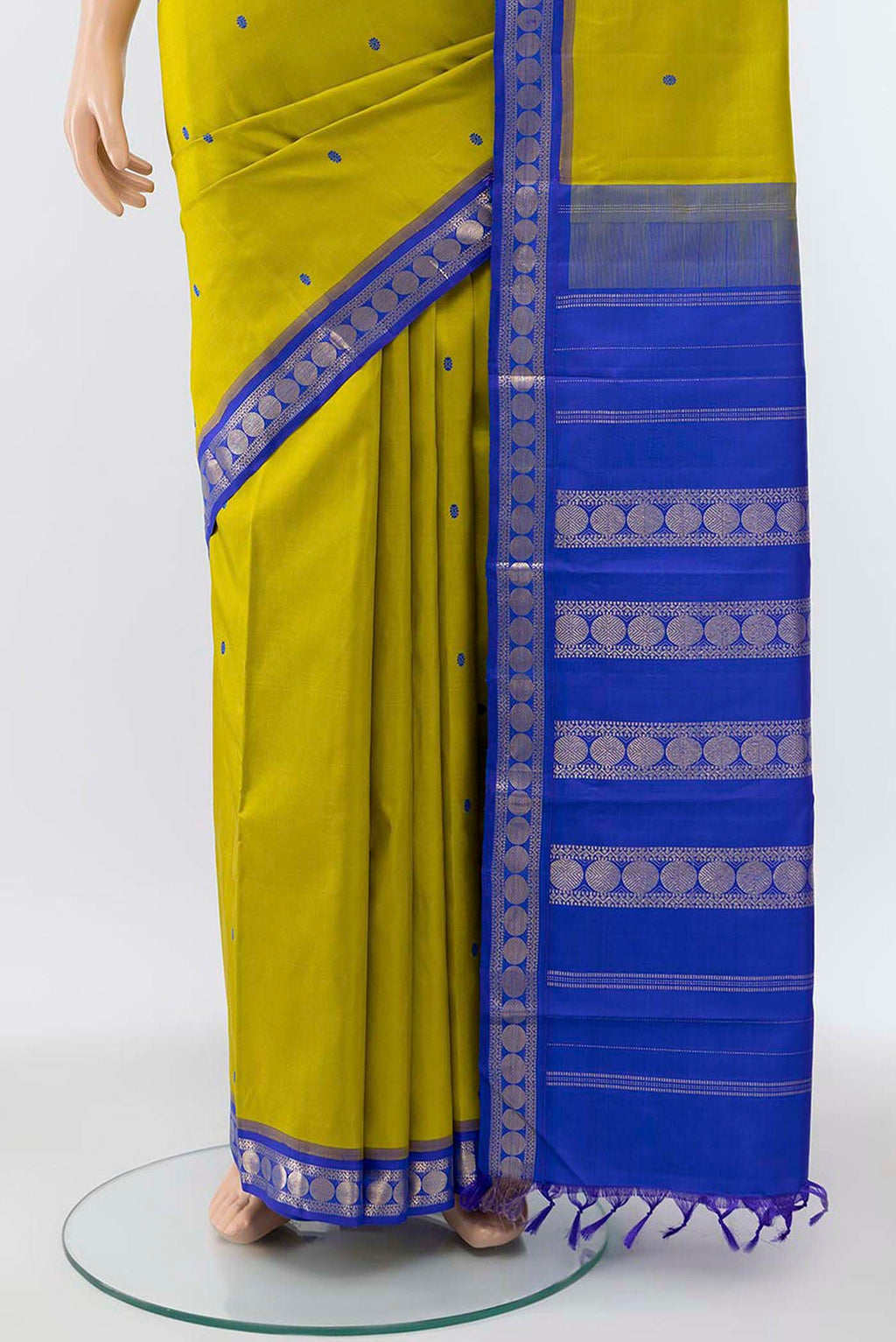 Pleats and pallu of Acid Green Kanchipuram Silk Saree with Thread Butta on the body and Zari Border