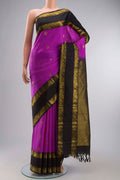 Violet Kanchipuram Silk Saree with Zari Butta on the body and Zari Border displayed on a mannequin