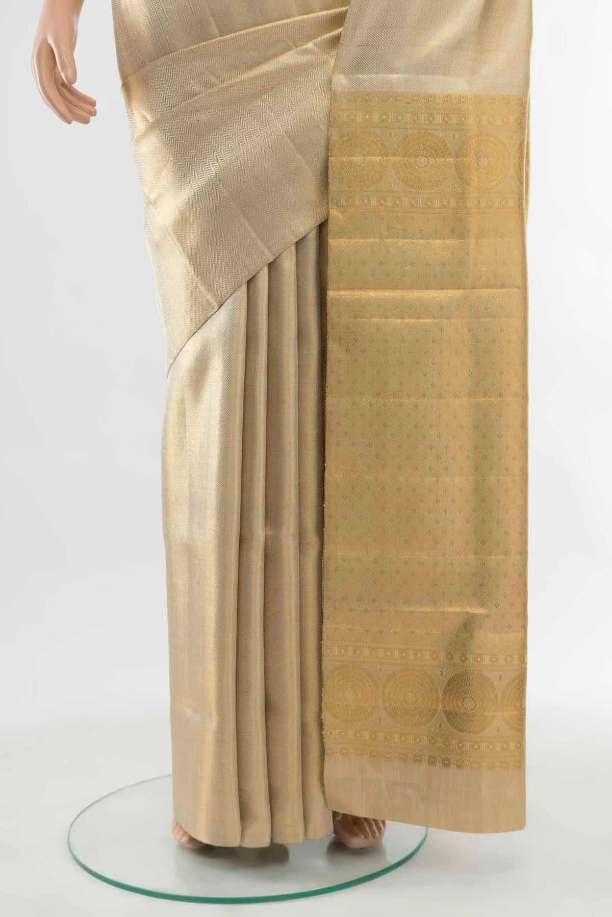 Pleats and pallu of Golden Kanchipuram Silk Saree with Zari Butta on the body and Silk Border