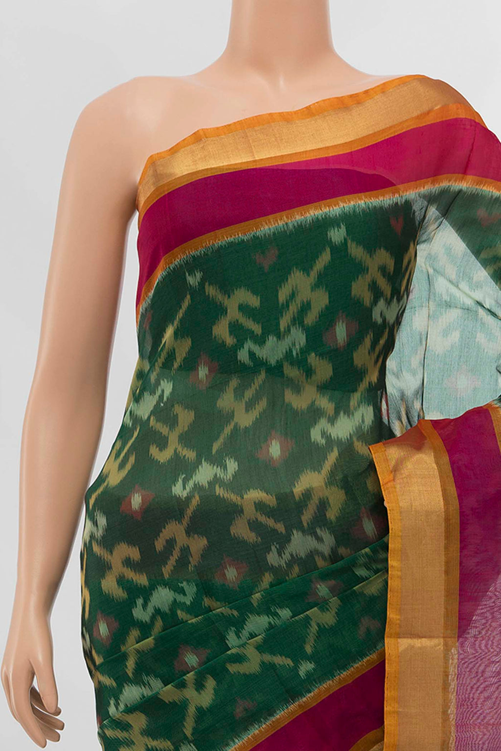 Border image of Green Silk Cotton Saree with Zari Butta on the body and Silk Border