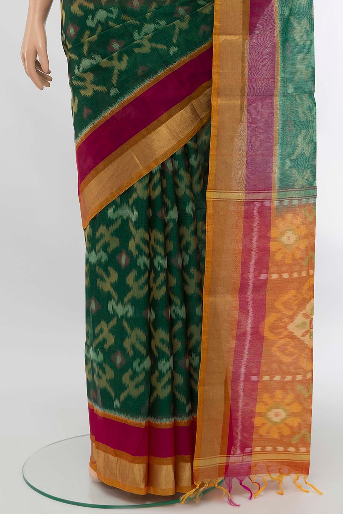 Pleats and pallu of Green Silk Cotton Saree with Zari Butta on the body and Silk Border