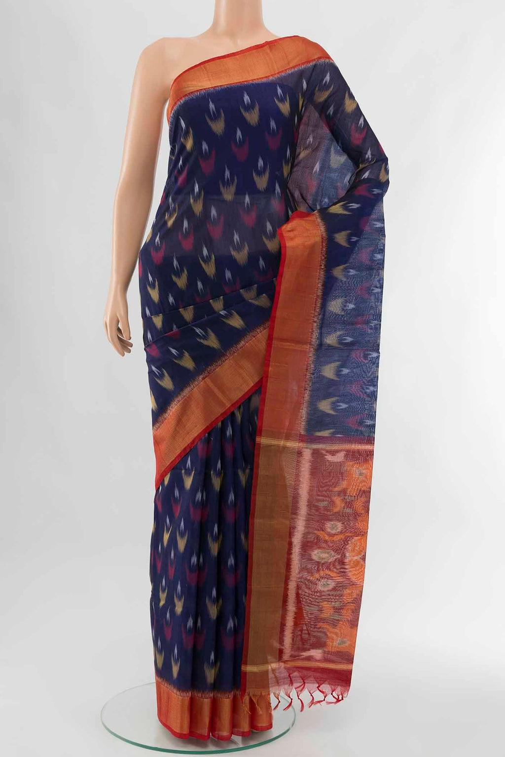 Navy Blue Kora Cotton Saree with Ikat Print on the body and Fancy Border displayed on a mannequin