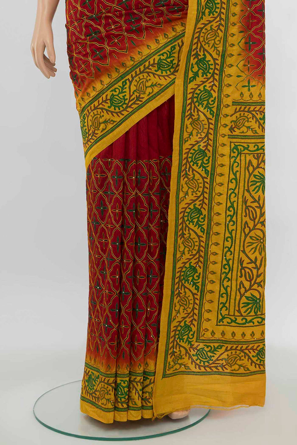 Pleats and pallu of Maroon Art Silk Saree with Embroidery on the body and Silk Border. 