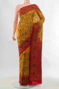 Yellow Blended Raw Silk Saree with Embroidery on the body and Embroidery Border displayed on a mannequin
