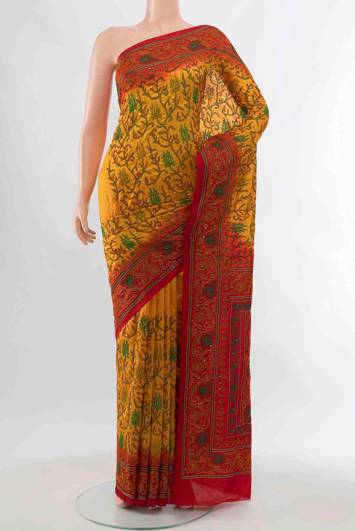 Yellow Blended Raw Silk Saree with Embroidery on the body and Embroidery Border displayed on a mannequin