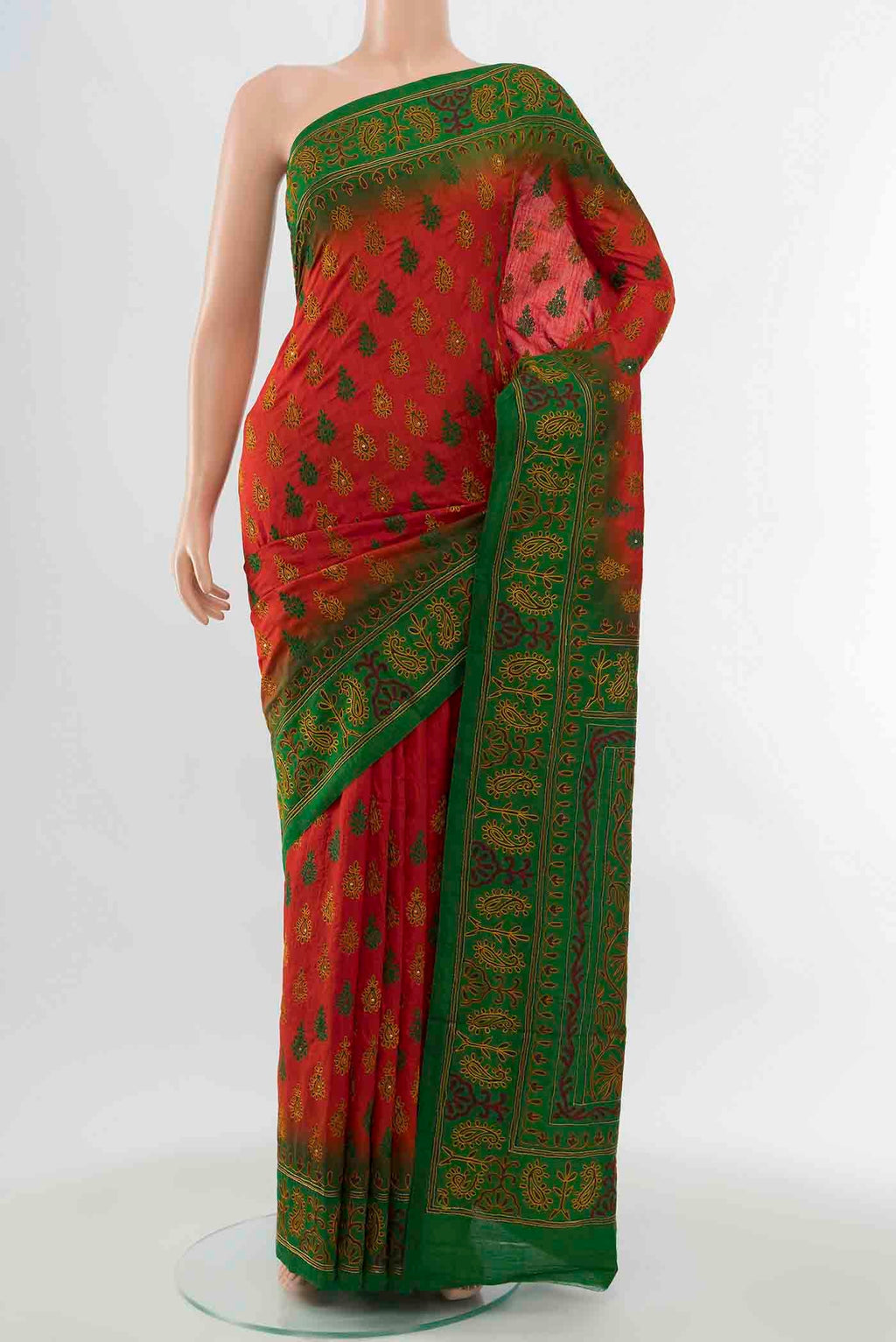 Red Blended Raw Silk Saree with Embroidery on the body and Embroidery Border displayed on a mannequin