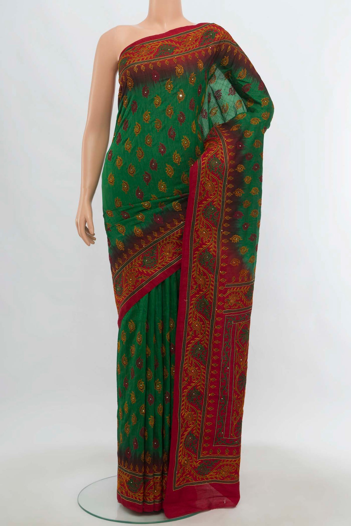 Bottle Green Art Silk Saree with Embroidery on the body and Embroidery Border.  displayed on a mannequin