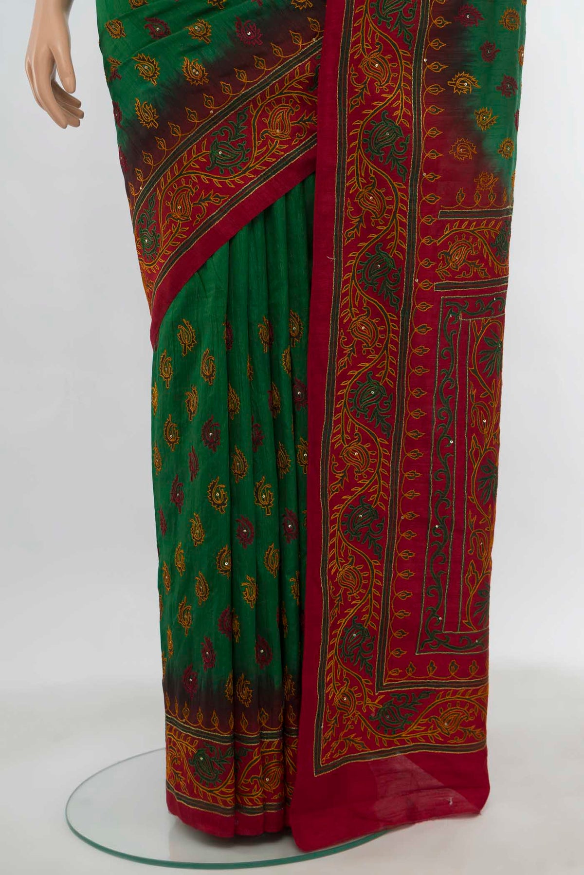 Pleats and pallu of Bottle Green Art Silk Saree with Embroidery on the body and Embroidery Border. 