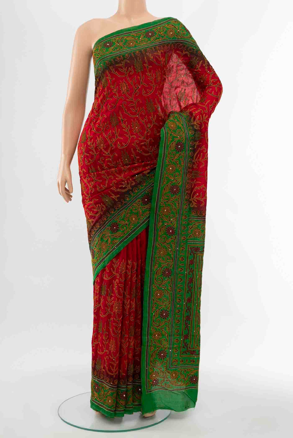 Red Blended Raw Silk Saree with Embroidery on the body and Embroidery Border displayed on a mannequin