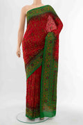 Red Blended Raw Silk Saree with Embroidery on the body and Embroidery Border displayed on a mannequin