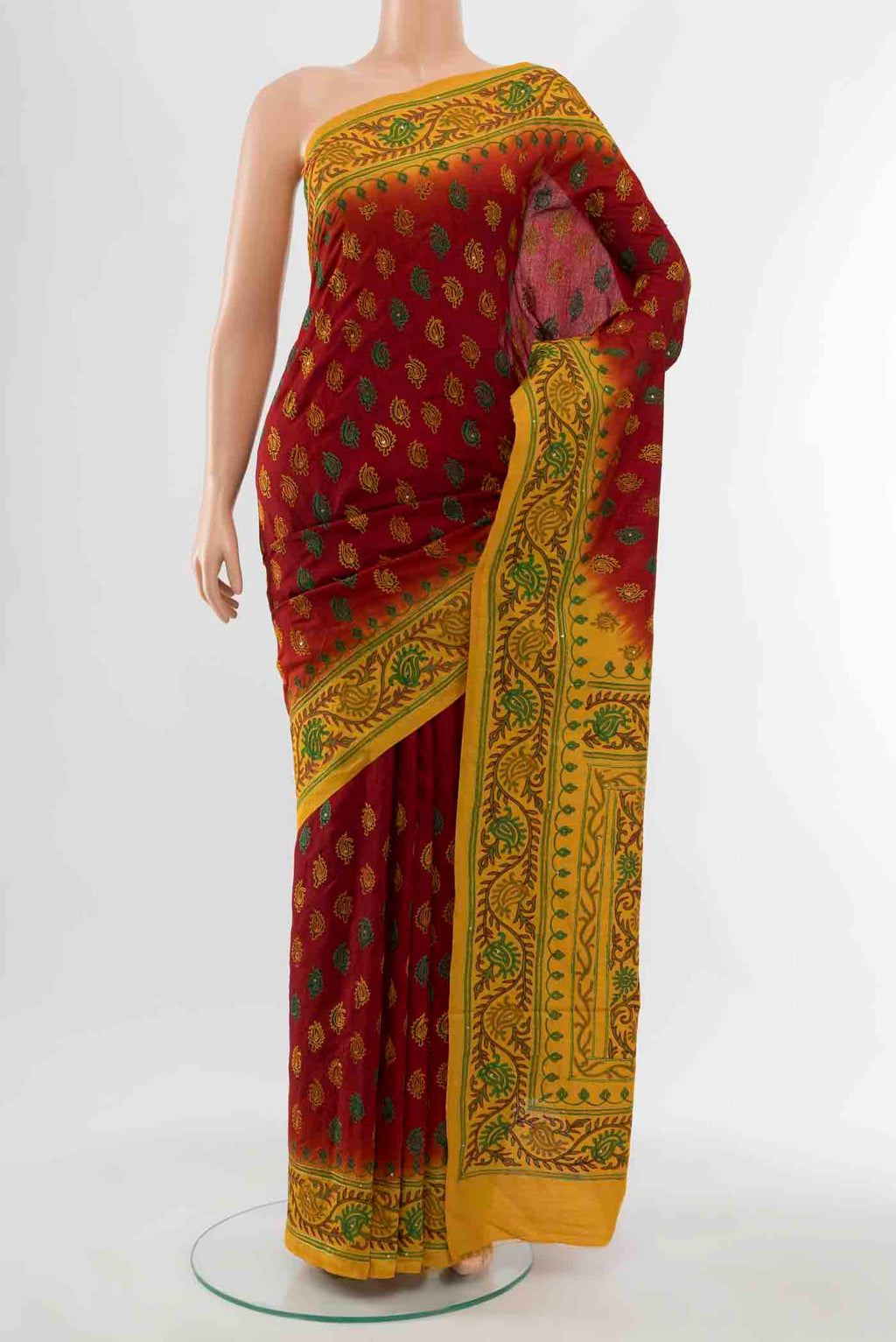 Maroon Blended Raw Silk Saree with Embroidery on the body and Embroidery Border displayed on a mannequin