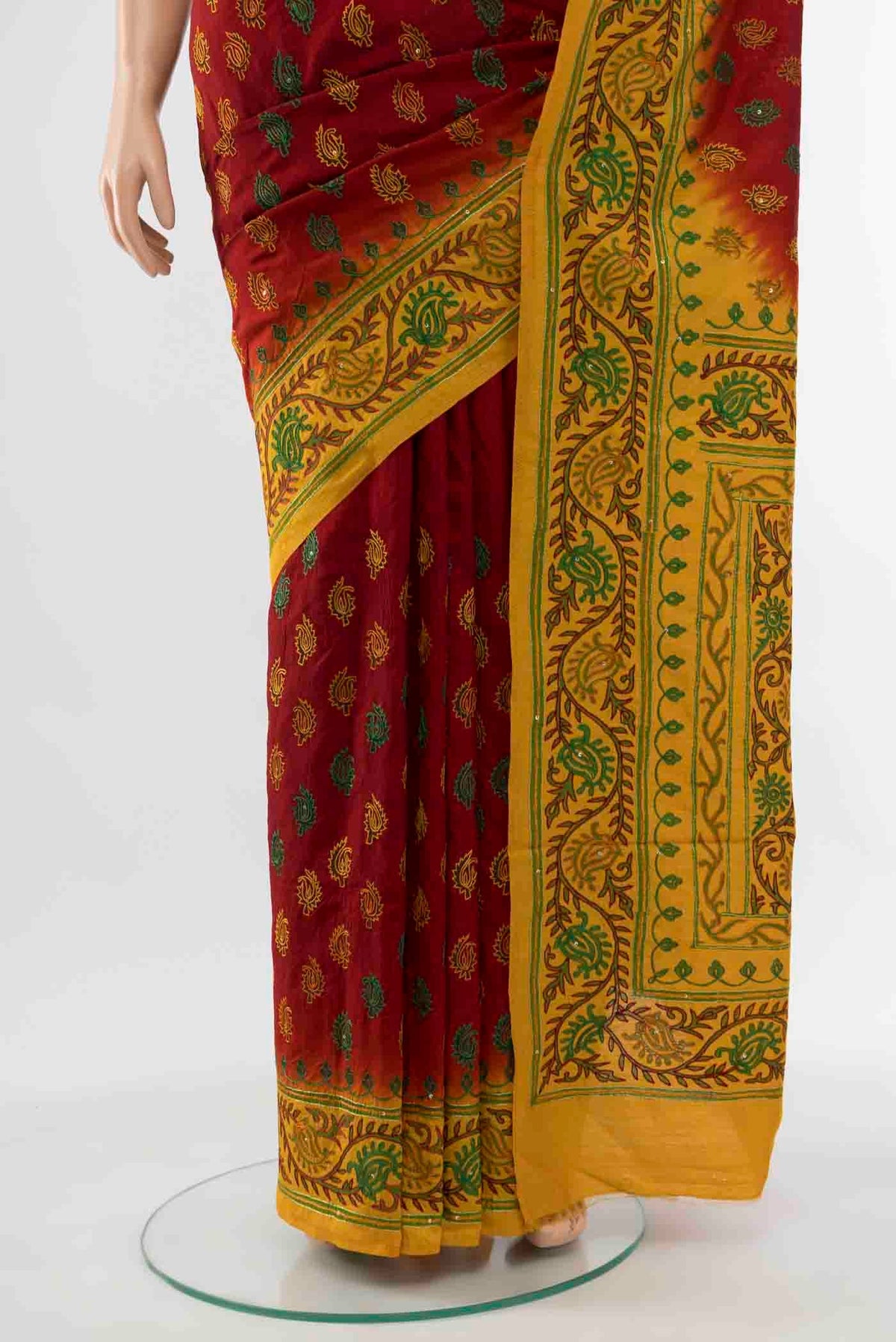 Pleats and pallu of Maroon Blended Raw Silk Saree with Embroidery on the body and Embroidery Border