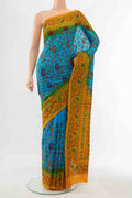 Sky Blue Blended Raw Silk Saree with Embroidery on the body and Embroidery Border displayed on a mannequin