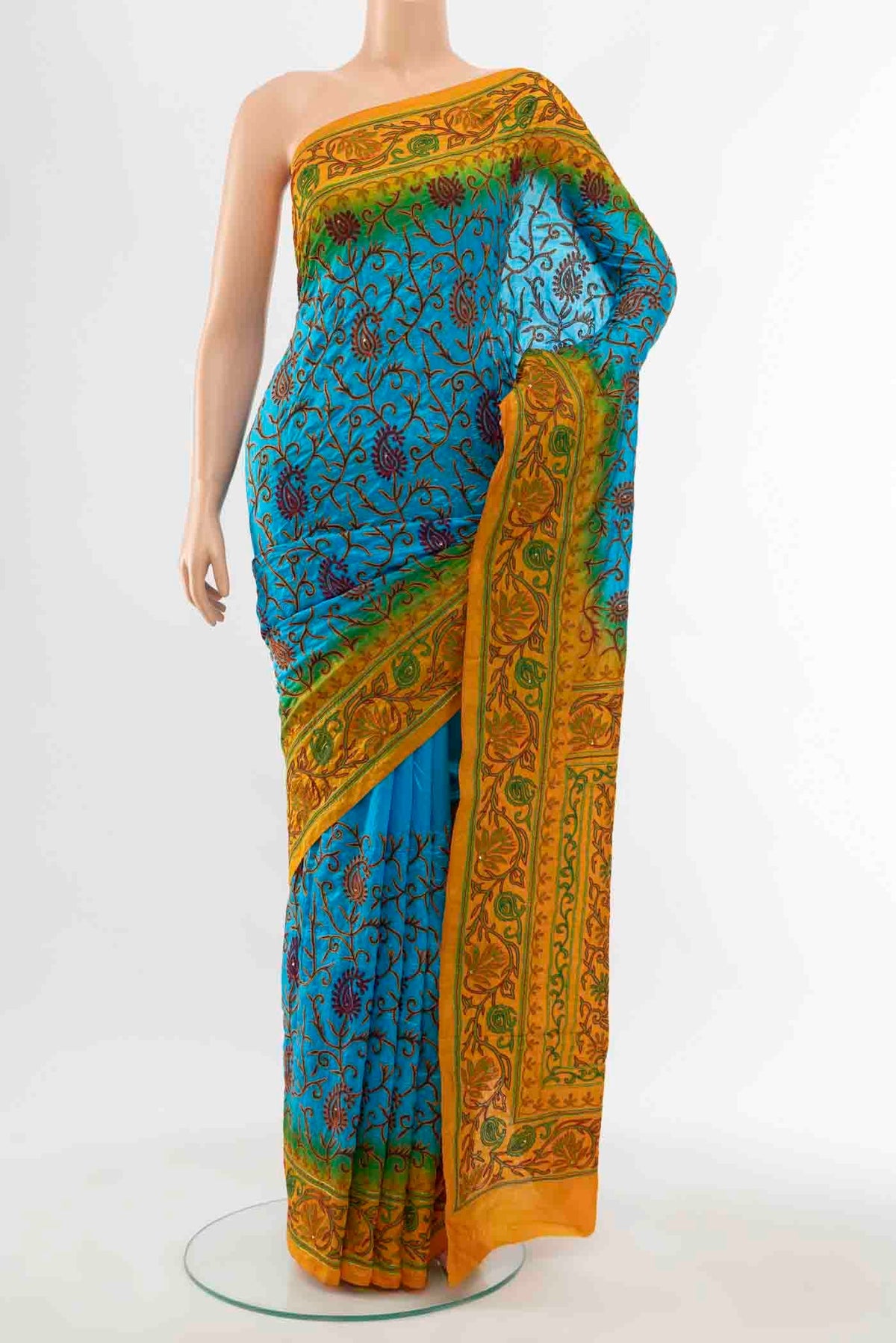 Sky Blue Blended Raw Silk Saree with Embroidery on the body and Embroidery Border displayed on a mannequin