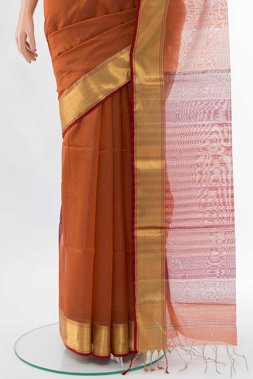 Pleats and pallu of Brown Maheshwari Silk Cotton Saree with Plain Body and Zari Border