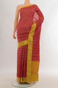 Pink Tussar Silk Saree with Floral Print on the body and Zari Border.  displayed on a mannequin